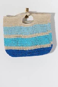 Add a pop of color to your summertime outfits with Shiraleah's Carmend Top Handle Bag. Made from woven paper strap with chic cutout handles and a striped design, this handbag will fit your needs from a night out to a day on the beach. Pair with other Shiraleah items to complete your look! Spring Striped Beach Bags, Striped Bags For Spring Beach Outings, Spring Beach Striped Bags, Summer Striped Woven Straw Bag, Rectangular Striped Shoulder Bag For Beach, Striped Rectangular Shoulder Bag For The Beach, Striped Woven Rectangular Beach Bag, Striped Rectangular Straw Bag With Braided Handles, Rectangular Striped Straw Bag For Summer