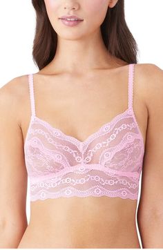 This sheer bralette looks cute (while being incredibly comfy) in slightly stretchy lace with a wide elastic band. 89% nylon, 11% spandex Hand wash, line dry Imported Lingerie Lace Camisole With Removable Bra Pads, Lace Camisole Bra With Removable Pads, Lace Camisole Bra With Lace Trim, Feminine Pink Sheer Bra, Bra Friendly Lace Camisole, Pink Feminine Bra With Delicate Lace, Feminine Pink Bra With Delicate Lace, Lace Camisole With Built-in Bra, Lace Underwire Bra With Stretch