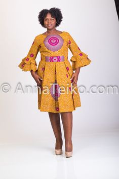 A gorgeous, vivid gold tone authentic African print midi dress, fit at the bodice and flares from the waist to right below the knee. with pleats, has 2 inside pockets. fully linned. Yellow Pleated A-line Midi Dress, Fitted Yellow Pleated Midi Dress, Gold Fitted A-line Midi Dress, Gold Knee-length Midi Dress, Ankara Short, African Attire Dresses, African Print Tops, African Print Clothing, Ankara Gown