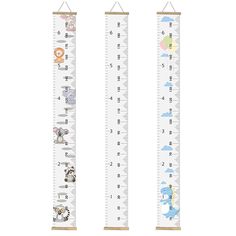 two tall growth rulers with animals on them, one is white and the other is blue