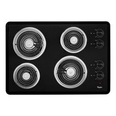 a black stove top with four burners