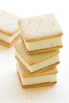 four crackers stacked on top of each other in front of a white and yellow striped background