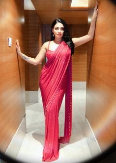 Magenta pink crystal embellished pre stitched saree with droplet crystal border paired with a ruched strappy blouse. 4k Portrait, Pre Stitched Saree, Neeru Bajwa, Strappy Blouse, Portrait Wallpaper, Sharara Designs, Stitched Saree, Nyc Studio, Saree Designs Party Wear