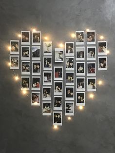 a heart made out of photos with lights around it