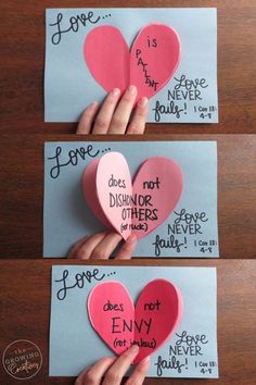 two pieces of paper that have been folded into the shape of hearts with words written on them