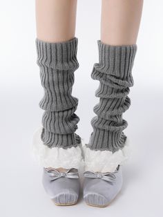 Elevate your outfit with these adorable knitted leg warmers. Perfect for adding a touch of sweetness to any look, these leg warmers feature delicate cotton lace trim and a cozy knit fabric. Embracing the popular Korean fashion style, these leg warmers are a versatile addition to your wardrobe. The flared design adds a playful and feminine touch, making them a perfect match for skirts, dresses, or even shorts.  Please note that this product includes one pair of leg warmers only. Fitted Knitted Gray Socks, Cute Fitted Winter Socks, Fitted Lace Trim Socks For Winter, Fitted Lace Trim Winter Socks, Soft Cotton Leg Warmers For Fall, Stretch Knitted Gray Leg Warmers, Stretch Gray Knitted Leg Warmers, Gray Stretch Knitted Leg Warmers, Gray Knitted Fitted Leg Warmers