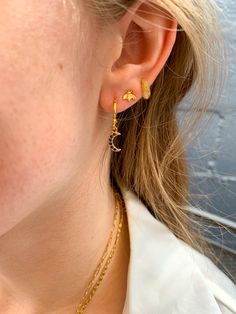 These tiny Huggies are perfect for a minimalist look, but add a little fun texture. 9 mm. They work in your lobe if you have smaller ears and they work very well in your cartilage or halfway up your ear! Great every day earring you don’t have to worry about. 100% US grade gold filled materials. Waterproof and tarnish resistant style. Very Well, Ear Cuff, Gold Filled, Every Day, Pearl Earrings, Texture, Gold