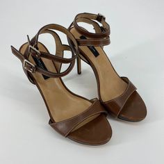 Ann Taylor | Sling Back Brown Leather Heels 7.5. New With Tags No Flaws. Double Buckle Closure Color: Cognac / Brown Tags: Heels, Summer, Peep Toe, Stappy, Fancy, Evening, Date Night Classic Ankle Strap Sandals For Office, Classic Office Sandals With Ankle Strap, Brown Open Toe Office Sandals, Brown Ankle Strap Heels For Evening, Brown Heels With Heel Loop For Evening, Office Sandals With Heel And Ankle Strap, High Heel Sandals With Buckle Closure, High Heel Sandals With 4-inch Heel For Office, Leather Ankle Strap Sandals For Office