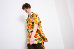 "Vintage Shirt Tropical Hawaiian Surfer Peach Orange Yellow Beach Palms Sunset Skater Wave Oversized Button Up Collared Light Top Short Sleeve Wing Tip Collar Unique Fun Vacation Unisex 90s Y2K. Tag: Biz Collection. Measured lying flat (backside): Length from shoulder: 32 3/4\" / 84 cm. Shoulder to shoulder: 20 1/2''/ 53 cm. Sleeve length from shoulder: 9 1/2''/ 25 cm. Material: 100% Polyester. Color: Orange, White, Yellow, Red. Size tag on item: XL. Approximate modern size: L/XL. Weight: 0.175 Orange Casual Hawaiian Shirt With Camp Collar, Casual Orange Hawaiian Shirt With Camp Collar, Retro Summer Camp Shirt For Streetwear, 90s Inspired Summer Streetwear Shirt, 90s Inspired Streetwear Summer Shirt, Casual Hawaiian Shirt For Streetwear, Oversized Vintage Beach Tops, 90s Long Sleeve Summer Shirt, 90s Style Long Sleeve Summer Shirt