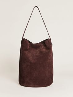 Hold me. Shop the Seleena Bucket Bag from Reformation, a bucket bag with a shoulder strap. Suede Bucket Bag, Evening Shoulder Bag With Bucket Shape, Evening Bucket Shape Shoulder Bag, Chic Bucket-shaped Hobo Bag With Dust Bag, Brown Suede Bucket Bag, Shopping Wishlist, The Reformation, Work Wear Outfits, Sustainable Bag