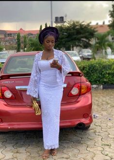 White pencil lace dress Pencil Gown Lace Styles, White Owanbe Lace Styles, White Lace Outfits For Women, White Short Gown Styles, Style For White Lace Gown, Africa Lace Dress Styles, Gown Styles For Lace Material, White Lace Gown Styles Aso Ebi, Women Lace Dress Classy