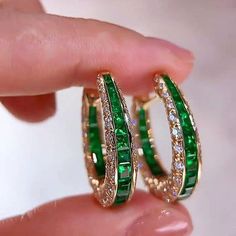 Vintage Hoop Earrings, Round & Emerald Cut Emerald Sapphire Earring, 14K Solid Gold Earrings, Green Emerald Earrings, Huggies Hoop Earrings Specifics: Main Stone: Cubic Zirconia Main Stone Shape: Emerald Cut  Side Stone: Cubic Zirconia Side Stone Shape: Round Cut If you want to add a personal touch to this piece contact us and we will create one just for you. You can customize the following things given below: PAYMENT POLICY 1. We accept payment via PayPal only. 2. You can also use a credit card Gold Earrings Emerald, Green Emerald Earrings, Earrings Huggies, Sapphire Earring, Jeweled Earrings, Earrings Round, Solid Gold Earrings, Hoops Earrings