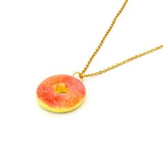 A Super cute and realistic Gummy Peach Ring charm has been handmade by me from polymer clay. They have a realistic "sugar" texture.  Charms measure about 1", total necklace length about 18". Choose between gold plated or surgical steel (hypoallergenic & non-tarnish) Chain.Matching earrings and keychain in my shop>> http://fatallyfeminine.etsy.com*These are made to order, please expect a 2 week delay from time of purchase until time of shipment.**Every order comes with free gift packagi Sweet Handmade Polymer Clay Jewelry, Handmade Sweet Polymer Clay Jewelry, Handmade Polymer Clay Kawaii Jewelry, Handmade Kawaii Polymer Clay Jewelry, Handmade Resin Jewelry In Sweet Style, Handmade Sweet Resin Jewelry, Sweet Handmade Resin Jewelry, Peach Ring, Candy Charms