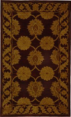 a brown and gold rug with an ornate design