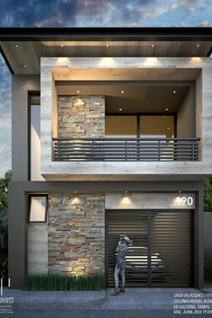 a man standing in front of a two story house with stone walls and balconies