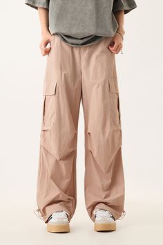 Functional Style With A Relaxed Fit These adjustable drawstring parachute cargo pants offer a lightweight, breathable, and durable construction, ensuring maximum comfort during wear. The unique parachute design blends a loose fit with versatile drawstring details, enhancing both the functionality and style of the pants. The drawstring cuffs allow you to customize the fit, creating different silhouettes to suit your style. Style #: WWAJ048 Parachute Design, Parachute Cargo Pants, Loungewear Summer, Parachute Cargo, Tranquil Blue, Tank Top Skirt, Casual Activewear, Functional Style, Silk Knit