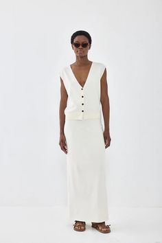 Knitted Maxi Skirt – Dé Rococo Spring Workwear Ribbed Skirt, Spring Ribbed Workwear Skirt, Spring Ribbed Skirt For Workwear, Chic Ribbed Summer Skirt, Summer Workwear Skirt, Fitted Ribbed Skirt For Summer, Elegant Ribbed Skirt For Summer, Versatile Summer Workwear Skirt, Versatile Fitted Summer Skirt