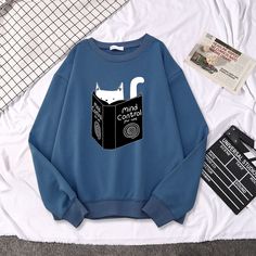 Trendy Blue Sweatshirt With Cartoon Print, Cat Design Cotton Long Sleeve Sweatshirt, Casual Cotton Sweatshirt With Cat Design, Casual Cotton Sweatshirt With Cat Print, Trendy Cotton Sweatshirt With Cat Print, Trendy Long Sleeve Sweatshirt With Cat Design, Cotton Crew Neck Sweater With Cat Design, Cotton Crew Neck Sweatshirt With Cat Design, Casual Cat Print Sweatshirt For Streetwear