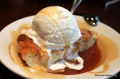 a piece of bread pudding with ice cream on top