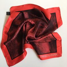 "This is a Dyrberg/Kern designer square silk scarf in red and black. This silk neckerchief has an abstract print which represents feathers. This luxury neck scarf has rolled hand stitched edges. Era: 90s Brand: Dyrberg Kern Condition: great condition, beautifully preserved with no signs of wear Measurements:  20\" ( 51 cm) * 19.3\" (49 cm) Colors: red and black Material: Silk Shipping: I will ship your item within 1-2 working days from Varna, Bulgaria. Items shipped within the European Union usually take around 6-10 working days. Overseas delivery usually takes around 15-20 working days. Depending on the destination country and the postal services it might take longer but should not take more than 21 business days.  Returns: If for any reason you feel like the item you have ordered is not Abstract Feather, Silk Neck Scarf, Square Silk Scarf, Luxury Silk, Feather Print, Neck Scarf, Neck Scarves, Abstract Print, Red And Black