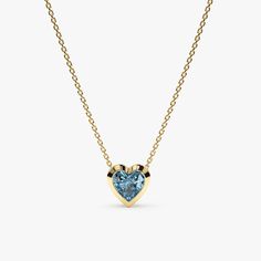 This stunning Blue Topaz Heart Necklace adds a touch of cool elegance and sophistication to any outfit. The necklace features a dainty solid gold chain (available in your choice of yellow, rose, or white gold) and a sparkling heart-shaped blue topaz gemstone, set in a protective and stylish solid gold bezel setting. - Handmade - Solid Gold - Natural Topaz - Heart Size: 7.5 mm - Total Diamond Carat Weight: 0.54 ctw 🛠 Your Sarah Elise piece is handcrafted with care! Ready-to-ship items go out within 3 business days. Made-to-order pieces typically take 7-10 business days to create. If you need something sooner, please contact us - we'll see if we can make it happen! For estimated shipping dates and tracking, check your Etsy account under 'Orders'. 🚐Orders under $100 are sent with USPS First Elegant Blue Heart Necklace With Birthstone, Elegant Blue Birthstone Heart Necklace, Blue Topaz Heart Necklaces, Singers Outfits, Backup Singers, Memory Ring, December Birthstone Necklace, Tranquil Blue, December Birthday