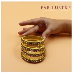 PRODUCT DETAILS: Product Code: AESB-2208- 30 Color: Solid colours (Set of 2) Color Variants: Silver Grey, Dull Gold Material: Plastic, Glass Polki Bead and Silk Sizes: 2.6 & 2.8 (It is advisable to take 1-size larger than your regular bangle size) Dimension: 35 grams in weight (for 2 pieces) Description: Each set of bangles contains a set of 2 bangles of a single color. They are beautiful silk-thread bangles with glass polki embellishment. bangle is a single solid color. They add such an amazing touch to your outfit! It is great for stacking or layering, too. The bangle is made of plastic, hence is flexible and stress-resistant DISPATCH:  These products are sourced directly from the artisans. If readily available in stock, the product will be dispatched within 3 business days. If not, they Pakistani Bangles, Indian Bangles, Womens Bangles, Silk Thread Bangles, Thread Bangles, Bangles Indian, Fake Tan, Bangle Set, Silk Thread