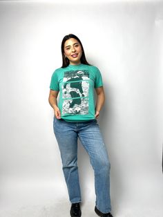 SUMMER SALE |  ALL 25% OFF | FREE SHIPPING | FREE BUNDLE STICKERS | EXCHANGES ALL MONTH | ENDS JULY 31st Embrace the laid-back vibes of reggae and the spirit of Bob Marley with our exclusive Vintage Bob Marley Bleached Shirt - a harmonious blend of musical legend and artistic flair. This unique band tee is a serendipitous find, carefully cropped for a contemporary twist, and enhanced with a special bleaching process, creating a one-of-a-kind piece that captures the essence of Bob Marley's timele Green Relaxed Fit Top With Graphic Design, Green Band Merch Tops For Summer, Green Cotton Band Merch Top, Green Band Merch Shirt With Screen Print, Green Graphic Band Merch Tops, Bob Marley Shirt Outfit, 2000s Shirts, Vintage Bob Marley, Bob Marley Shirt