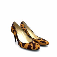 Step into elegance and style with the Talbots Womens Size 7AA Brown Animal Print Stiletto Heels Pumps. These stunning heels are designed for the modern woman who values both fashion and comfort. The rich brown color, adorned with a chic animal print pattern, adds a touch of wild sophistication to any outfit. Crafted from high-quality faux animal hair, these pumps not only elevate your look but also provide a soft, luxurious feel against your skin. Perfect for casual outings or special occasions, Fabulous Style, Vintage Trucker Hats, Pumps Heels Stilettos, Black Heel, Accessories Bags Purses, Dressy Outfits, Calf Hair, Kids Boots, Stiletto Heel