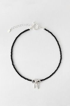 Our Maisie bow with black onyx beads. Emo Phase, Hoop Charms, Onyx Necklace, Silver Bow, Silk Cord, Onyx Bead, Something Went Wrong, Cord Necklace, Chain Ring