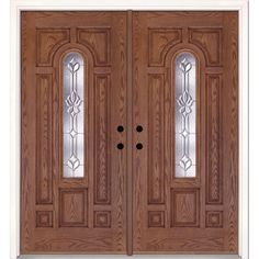 two double doors with sidelights and glass panels on the front door, both in dark wood