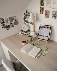 a desk with an open book on it