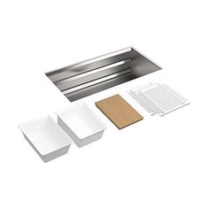 an assortment of kitchen accessories including trays, grates and spatulas on a white background