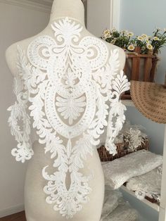 New design ivory large and unique embroidery lace applique for wedding gown / bridal dress decors , or haute couture pattern lace applique Size is about 40x60 cm , sold by per piece .Can be used for back of wedding gown, bridal dress hem lines , bodices .Similar stylehttps://www.etsy.com/listing/399141331/ivory-wedding-lace-applique-bridal-lace?ref=shop_home_feat_2https://www.etsy.com/listing/268363739/beautiful-3d-venice-lace-applique-for?ref=shop_home_feat_3https://www.etsy.com/listing/5245014 Illusion Bridal Gown, Large Embroidery, Bodice Applique, Gown Bridal, Unique Embroidery, Crazy Quilting, For Wedding Dress, Wedding Lace, فستان سهرة