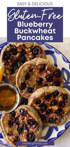 blueberry buckwheat pancakes on a plate with syrup