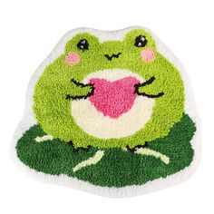 a rug with a frog on it's back and its tongue sticking out to the side