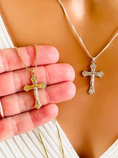 This is a beautiful 925 sterling silver crucifix cross necklace. This crucifix cross comes in all silver or two-tone sterling silver with gold plating. Chain is a box chain 1 mm with spring clasp in back. Gold version chain is 14 K gold filled, and the silver version chain is 925 sterling silver.  Model is wearing a 18 inch length in the sterling silver and a 16 inch length and the two-tone gold version. Please choose your desired length. This cross measures 30 X 18 mm. Comes in a gift box ready to present. Crucifix Necklace Silver, Gold Cross Necklace With Box Chain, Crucifix Cross Necklace With Box Chain, Crucifix Cross Necklace With Box Chain As Gift, Crucifix Box Chain Necklace As Gift, Crucifix Necklace With Box Chain For Gift, Box Chain Crucifix Necklace For Gift, Silver Crucifix Cross Necklace With Box Chain, Cross Necklace Aesthetic