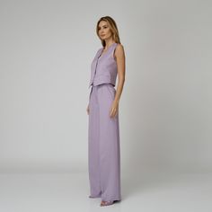 Introducing our Lylia Silk Crepe Pants, a statement of luxurious comfort and timeless style. Tailored from lavender silk crepe with a wide-leg cut, they feature expertly placed darts that contour the waist and flatter the silhouette. The pressed crease detail offers a touch of refinement, elevating the overall look with understated polish. A concealed zipper and hook fastening in the front ensures a seamless finish, while the inclusion of pockets adds a practical yet chic element to the ensemble.  Match: Complete the ensemble with the Lylia Silk Crepe Vest.  Each Il Volo item is designed with utmost care and produced in limited series, ensuring the highest standard of craftsmanship. 100% Italian Double Silk Satin.  Gentle dry clean. Do not wash. Do not use chlorine based bleach. Do not tum Crepe Pants, Lavender Silk, August Birthstone Jewelry, July Birthstone Jewelry, Gifts For New Mums, Jewelry Ring Box, Pearl Jewellery Earrings, Natural Silk, August Birth Stone