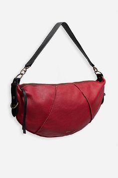 Crafted from 100% leather, the Rossa Italian Leather Raw Edge Faithful Bag is perfect for everyday. Featuring a wide shoulder strap and a unique crescent shape, this bag is finished with raw edges for a broken-in feel. Pair with a silk button-down and classic denim for a polished casual look. Johnny Was Women's Rossa Italian Leather Raw Edge Faithful Bag in Red, Silk/Leather/Denim Red Leather Saddle Bag With Detachable Strap, Red Leather Bag With Leather Trim, Red Leather Bags With Leather Trim, Everyday Red Leather Saddle Bag, Red Leather Saddle Bag For Everyday, Red Leather Crossbody Hobo Bag, Versatile Red Leather Shoulder Bag, Red Leather Shoulder Bag With Leather Backing, Red Shoulder Bag With Leather Backing For Everyday Use