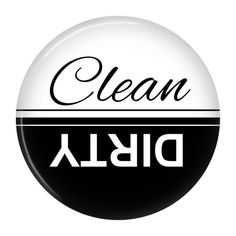 a black and white button with the word clean disl written in cursive writing