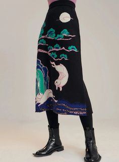 Adorable, lively, and fun 🐇 this knitwear midi skirt features rabbits frolicking beneath the moonlight. Traditional myths meet the colors of the 90s, this Xinzhongshi 新中式 (New Chinese Style) is perfect for expressing your love of Chinese aesthetics on a daily basis. Pair with the matching knit vest with more cascading bunnies, or pair with any top! This versatile piece adds a touch of magic to any ensemble. This item has varying construction periods, please check variant title carefully ~ Items Modern Hanfu, Fan Jewelry, Midi Skirt Outfit, Knit Midi Skirt, New Chinese Style, Wool Skirt, New Chinese, Retro Pattern, Knit Midi