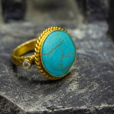 Ancient Roman Gold Turquoise Ring | Stackable Ring | 925 Sterling Silver Ring 24K Gold Plated | Greek Jewellery | Birthstone Ring Handcrafted hammered Silver Ring Our shop offer free ring sizing and color options.(Oxidized(Black),Gold Plated) Metal : 925 Sterling Silver Plated : 24K Gold Gemstone : Turquoise / Topaz Band Size : 3 mm Ring Weight : 5.7 grams Ring Size : US 6 (The size you want is made for free). (We used the US standard sizing) **Custom Orders is Made** As pellada family, we will Gold Turquoise Ring With Gemstone, Gold Turquoise Ring For Anniversary, Gold Turquoise Ring Gift, Gold Turquoise Ring For Gift, Gold Turquoise Ring With Gemstone For Anniversary, Handmade Yellow Gold Turquoise Ring, Handmade Turquoise Ring In Yellow Gold, Gold Oval Turquoise Ring Gift, Oval Gold Turquoise Ring Gift