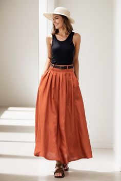 "This elegant orange linen skirt exudes a sense of vibrant sophistication. The skirt's lightweight fabric falls gracefully, creating a fluid silhouette that moves with the wearer. More Color : https://etsy.me/446pKjV DETAIL * 50% linen, 50% cotton  * Has no lining, Not see through * Pleated around waist * Two pockets * Belt loops on waistband * Right Side zipper closure * Perfect for spring and summer, autumn * Choose CUSTOM Order if you Can't find your size in our size Chart Change the Style Chang the Length Your Height is not Between 5'1\" - 5\"9\" Your weight is not Between 47 kg - 75 kg SIZE GUIDE Size vary between Brand and Country Please get your body measurement with our Size Guide And Find your size in our Size Chart SIZE CHART https://www.etsy.com/listing/736813677/ This Video of Solid Linen Skirt For Summer, Solid Linen Summer Skirt, Flowy Orange Maxi Skirt For Summer, Orange Flared Maxi Skirt For Summer, Pleated Linen Long Skirt, Orange Relaxed Flared Maxi Skirt, Flowy Full Orange Skirt, Orange Maxi Skirt For Summer, Elegant Orange Skirt For Spring