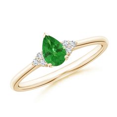 A captivating bright green tsavorite is secured in a prong setting and flanked by sparkling diamond clusters. Designed in 14k yellow gold, this pear-shaped tsavorite ring has an elegant and stylish appeal. Tsavorite Solitaire Ring, Teal Sapphire Ring, Tsavorite Ring, Montana Sapphire Ring, Sapphire Solitaire Ring, Teal Sapphire, Sapphire Solitaire, Montana Sapphire, Brilliant Diamond