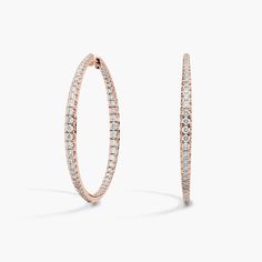 These large hoop earrings lend classic sophistication to your style, with the front-facing edges shimmering with gorgeous pave-set diamonds. They are designed in gleaming 14k rose gold for a romantic look of luxury. Diameter of hoop measures 1 1/2 Inches. Romantic Look, Large Hoop Earrings, Diamond Hoop Earrings, Blue Nile, Diamond Fashion, A Romantic, Fashion Earrings, Types Of Metal, Jewelry Earrings