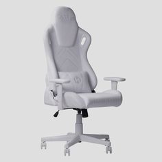 a white office chair sitting on top of a table