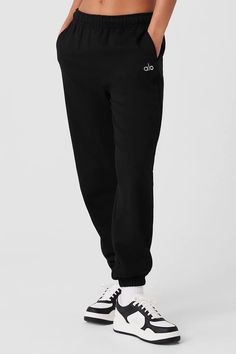 Muse Sweatpant - Black | Alo Yoga Alo Yoga Relaxed Fit Activewear With Ribbed Waistband, Casual Alo Yoga Pants With Ribbed Waistband, Sporty Alo Yoga Joggers For Loungewear, Trendy Joggers With Ribbed Waistband For Loungewear, Casual Alo Yoga Sweatpants With Ribbed Waistband, Casual Alo Yoga Activewear With Ribbed Waistband, Alo Yoga Bottoms With Ribbed Waistband, Alo Yoga Relaxed Fit Athleisure Joggers, Alo Yoga Athleisure Loungewear Bottoms