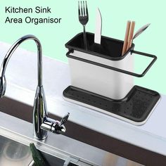 kitchen sink area organizer with utensils in it