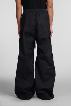 Cargobelas Pants in black cotton, oversized fit, coulisse closure, front zip closure, cargo pockets, four pockets, 97% Cottone 3% Spandex, Made in Italy, Model is 183 cm and wears 48 | Rick Owens Men's Cargobelas Pants in Black Cotton | SS24 Rick Owens Pants, Techwear Fashion, Rick Owens Men, Japanese Denim, Design Research, Fashion Line, Luxury Retail, Rick Owens, Oversized Fits