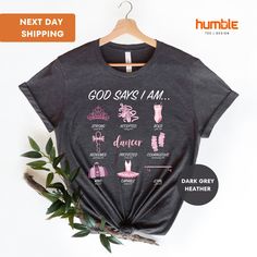 "God Says I Am Dancer T-shirt, Women's Dancer T-shirt, Ballet Gift, Ballerina Tee, Dance Shirt, Gift For Dancer ORDERING: 1. Review all photos 2. Choose Size and Color from drop-down menu 3. If personalization box is available, add your text color 4. Add each shirt to cart one at a time 5. Click \"Add to Cart\" - you can go back to add more products 6. Click \"Proceed to Checkout\" 7. Add note to seller for any requests * We use several different brand shirts, all of them are premium quality and Pre-shrunk Short Sleeve T-shirt For Dance, Short Sleeve Black T-shirt For Dance Class, Black Short Sleeve T-shirt For Dance Class, Pink Cotton T-shirt For Dance, Pink Letter Print T-shirt For Dance Class, Pink T-shirt With Graphic Print For Dance Class, Pink Graphic Print T-shirt For Dance Class, Pink Crew Neck T-shirt For Dance, Fitted T-shirt With Name Print For Dance Class