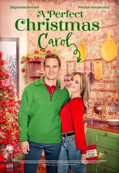 a man and woman standing next to each other in front of a christmas tree with the words perfect christmas card on it